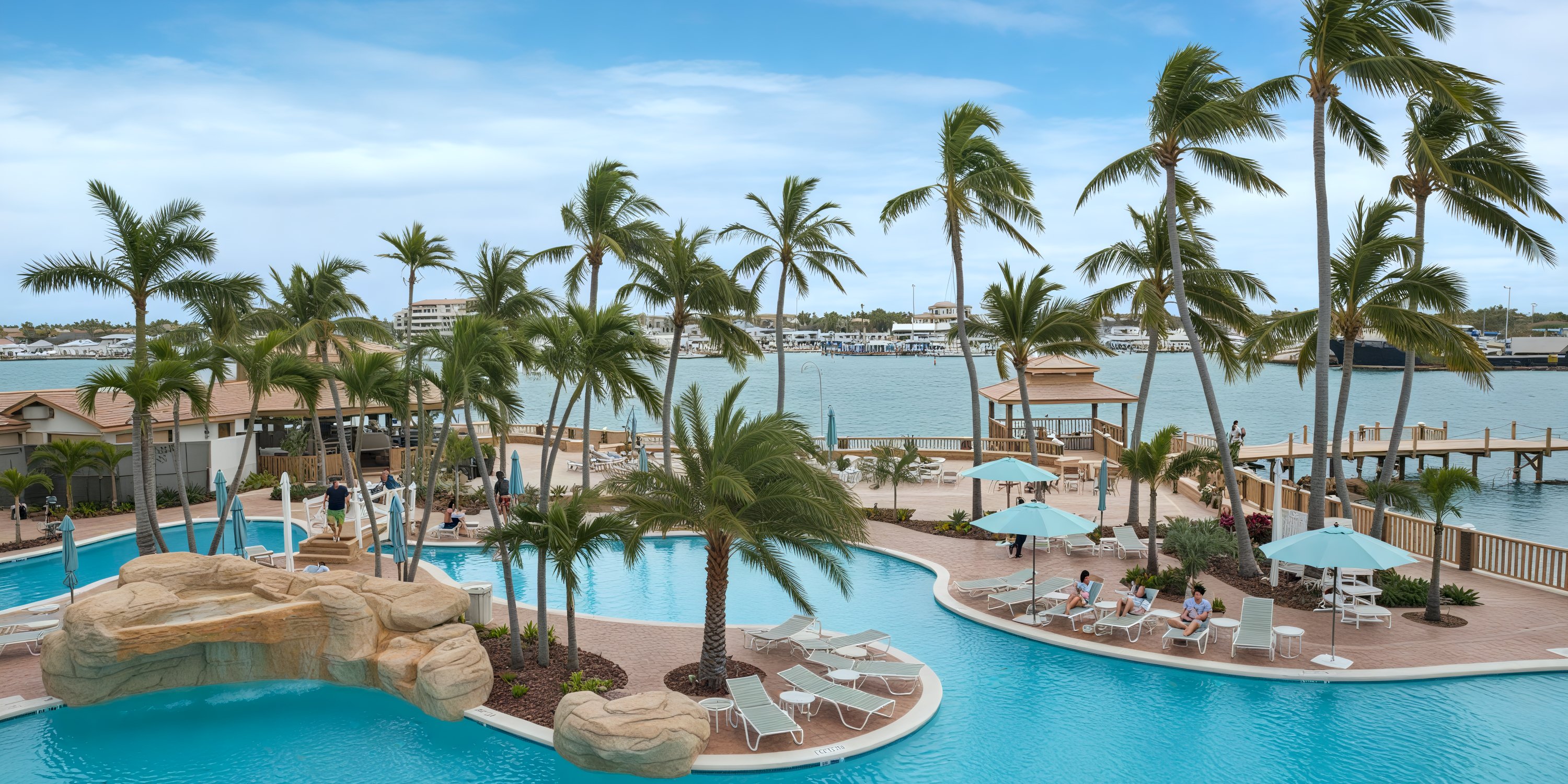 Warwick Paradise Island Bahamas: Outdoor pool with palm trees—perfect for a destination wedding backdrop.