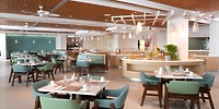 Warwick Paradise Island Bahamas: stylish dining, mint green chairs, perfect for a destination wedding.