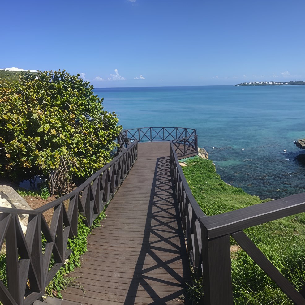 A wooden walkway over water, perfect for a romantic destination wedding ceremony or photo shoot.