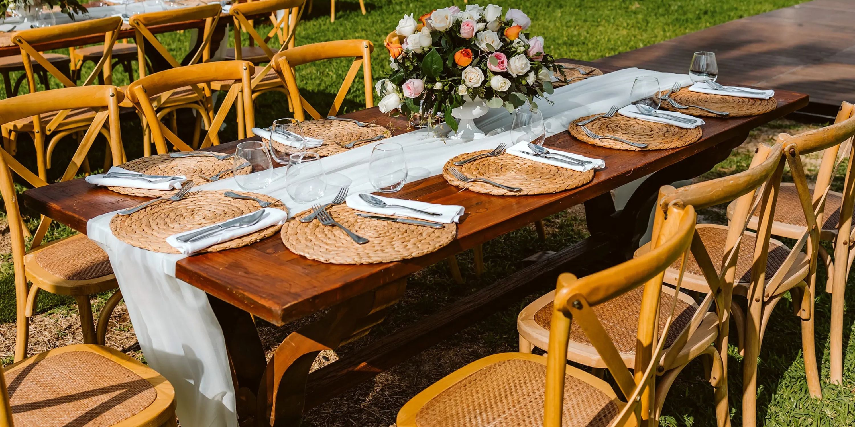 Table set for six at Moon Palace The Grand Punta Cana, decorated for a destination wedding with flowers.