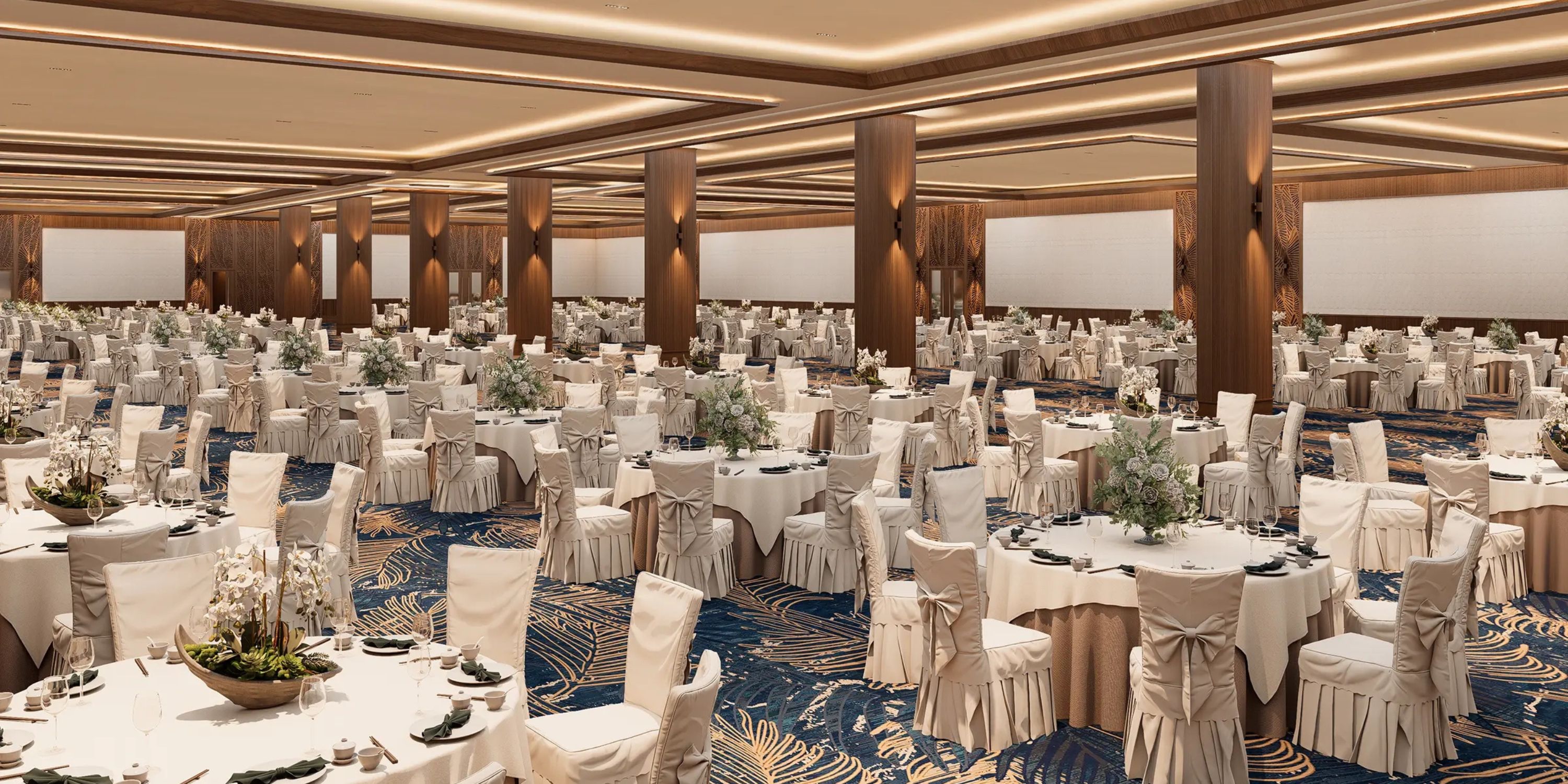 Moon Palace The Grand Punta Cana features a banquet hall with round tables, ideal for destination weddings.