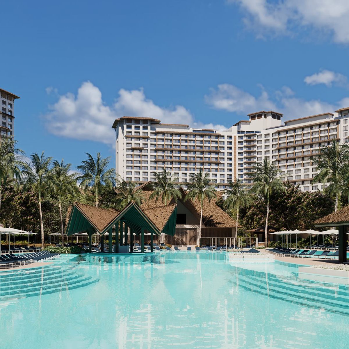 Large pool at Moon Palace The Grand, perfect for a destination wedding, with lounge chairs and palm trees.