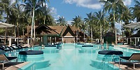 Large pool at Moon Palace The Grand, perfect for a destination wedding, with loungers and cabanas.