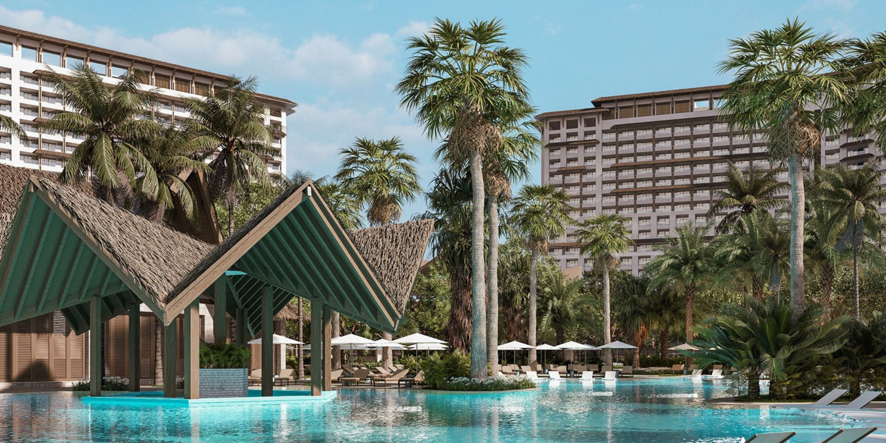 Moon Palace The Grand pool, perfect for a destination wedding, with palm trees and hotel buildings.