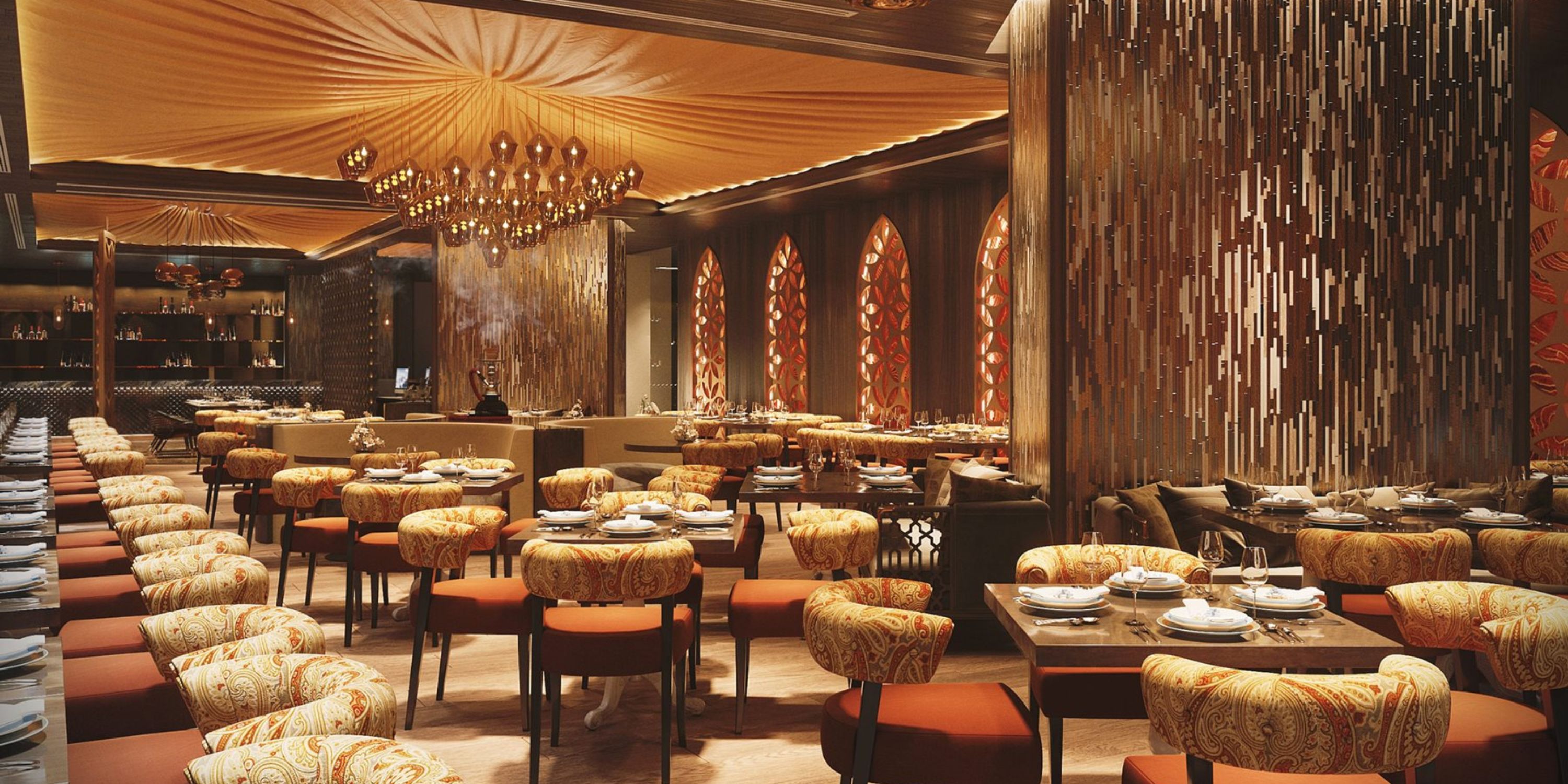 Moon Palace The Grand (Copy) offers a wedding-ready space with patterned chairs, set tables, and warm lighting.