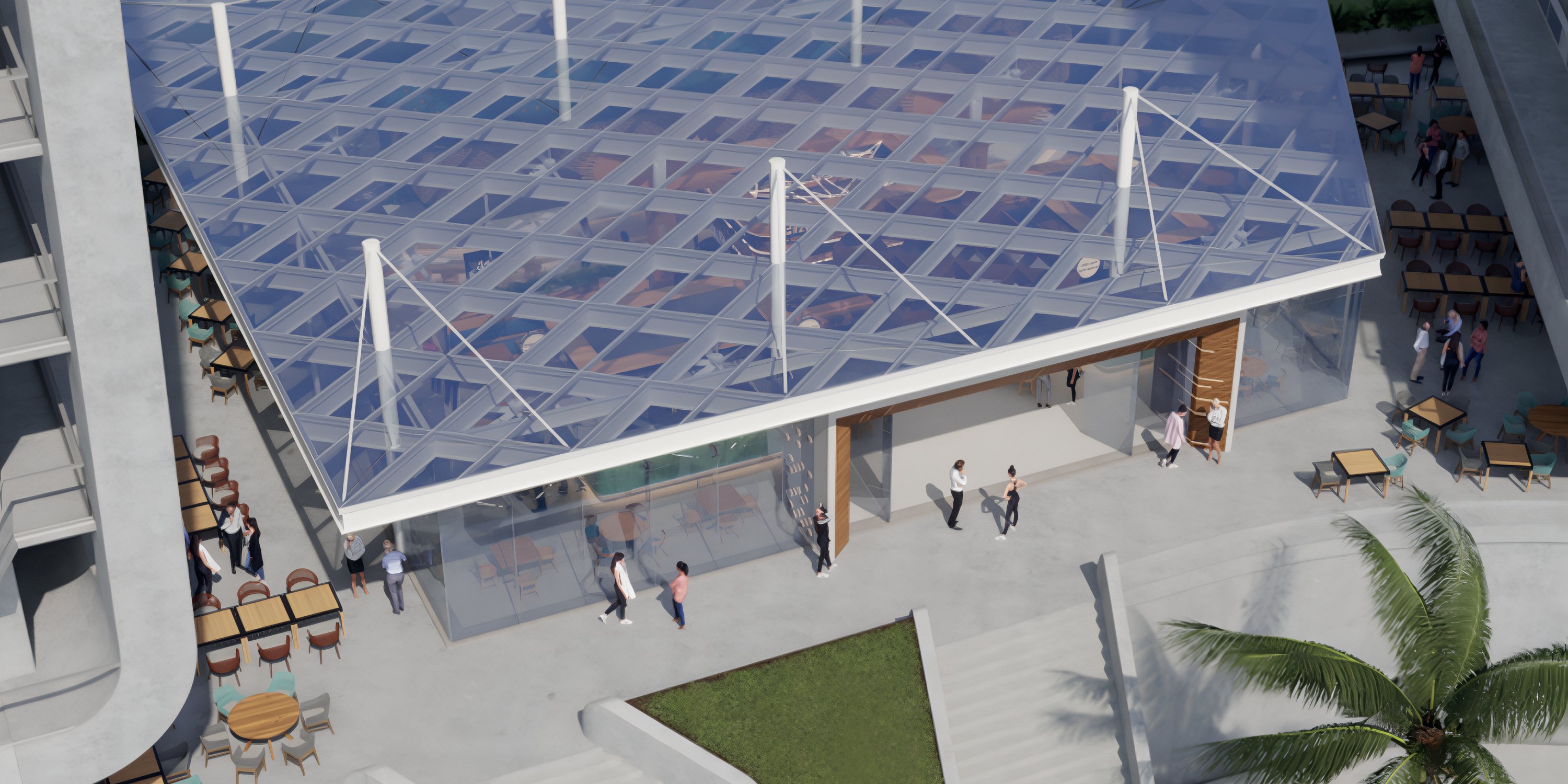 A modern glass-roofed pavilion, ideal for a destination wedding, with guests and outdoor seating areas nearby.