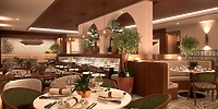 Hyatt Vivid Grand Island: elegant tables, green chairs, and potted plants for a wedding setting.