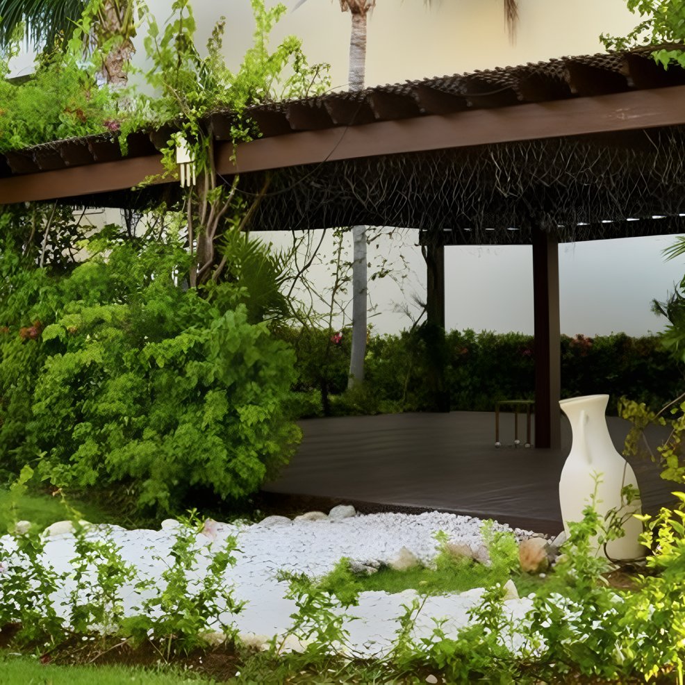 Covered wooden pergola with lush greenery, a white stone path, and a large vase&mdash;perfect for weddings.