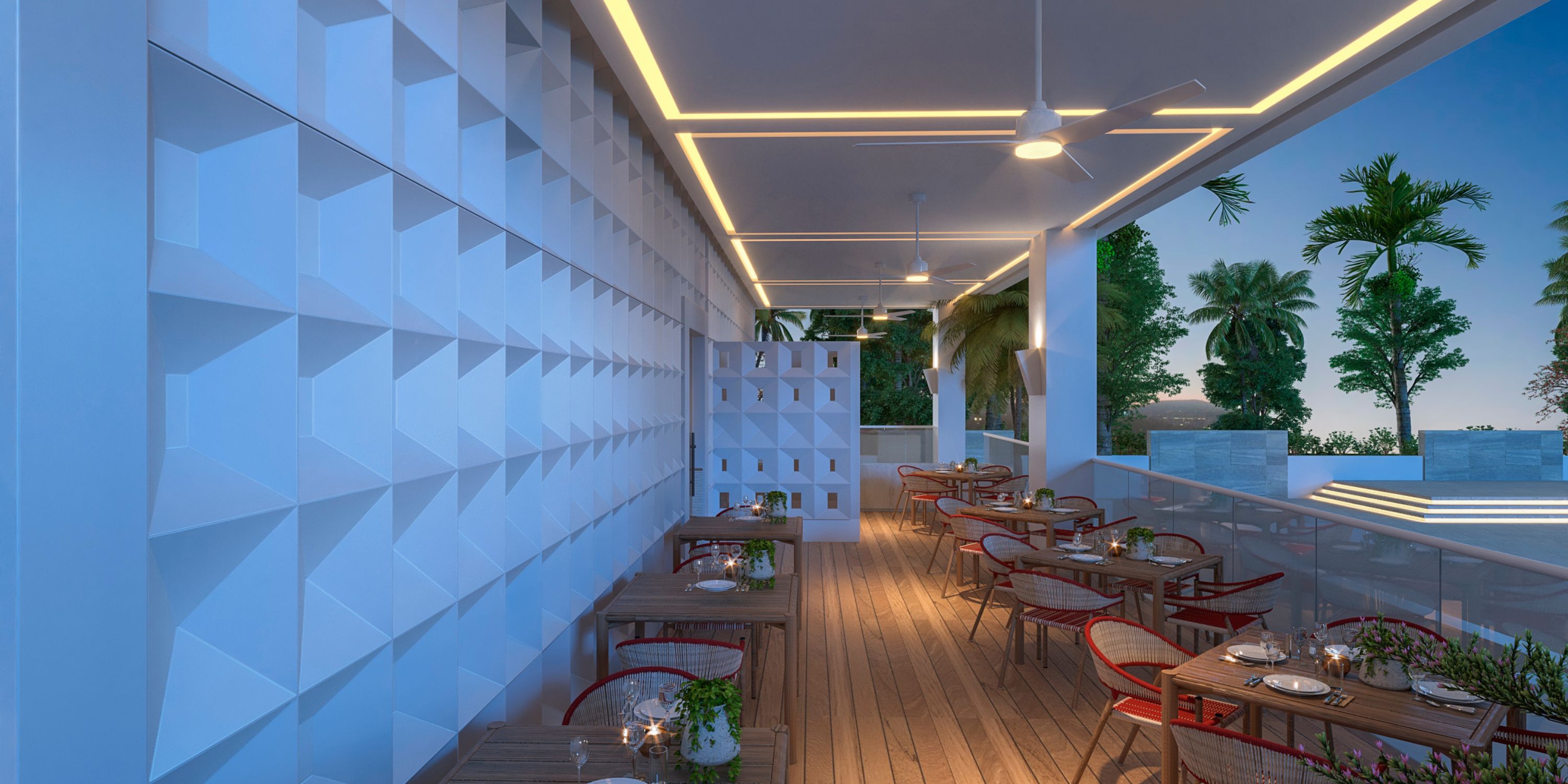 Royalton Chic Antigua&rsquo;s outdoor dining is ideal for a destination wedding, with a geometric white wall and wooden floors.