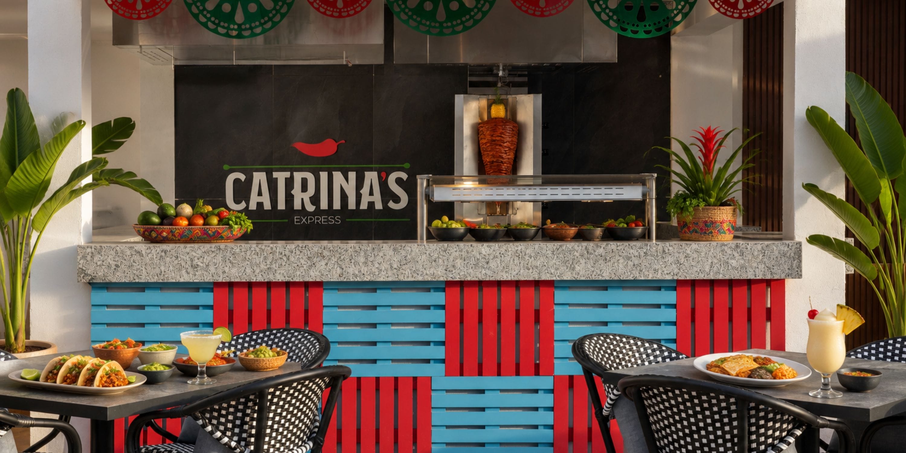 Royalton Vessence Barbados: Outdoor Mexican counter&mdash;ideal for wedding tacos, drinks, festive decor.