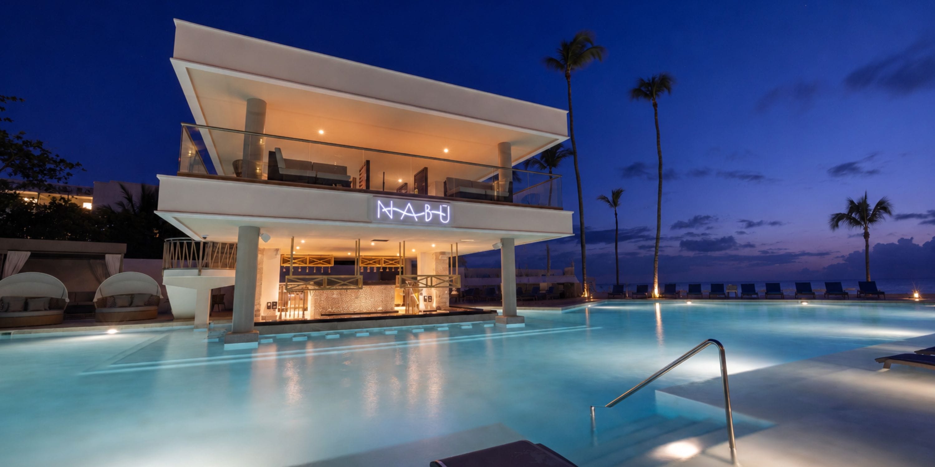 Royalton Vessence Barbados: Poolside bar, lounge, and palm trees&mdash;perfect for destination weddings.