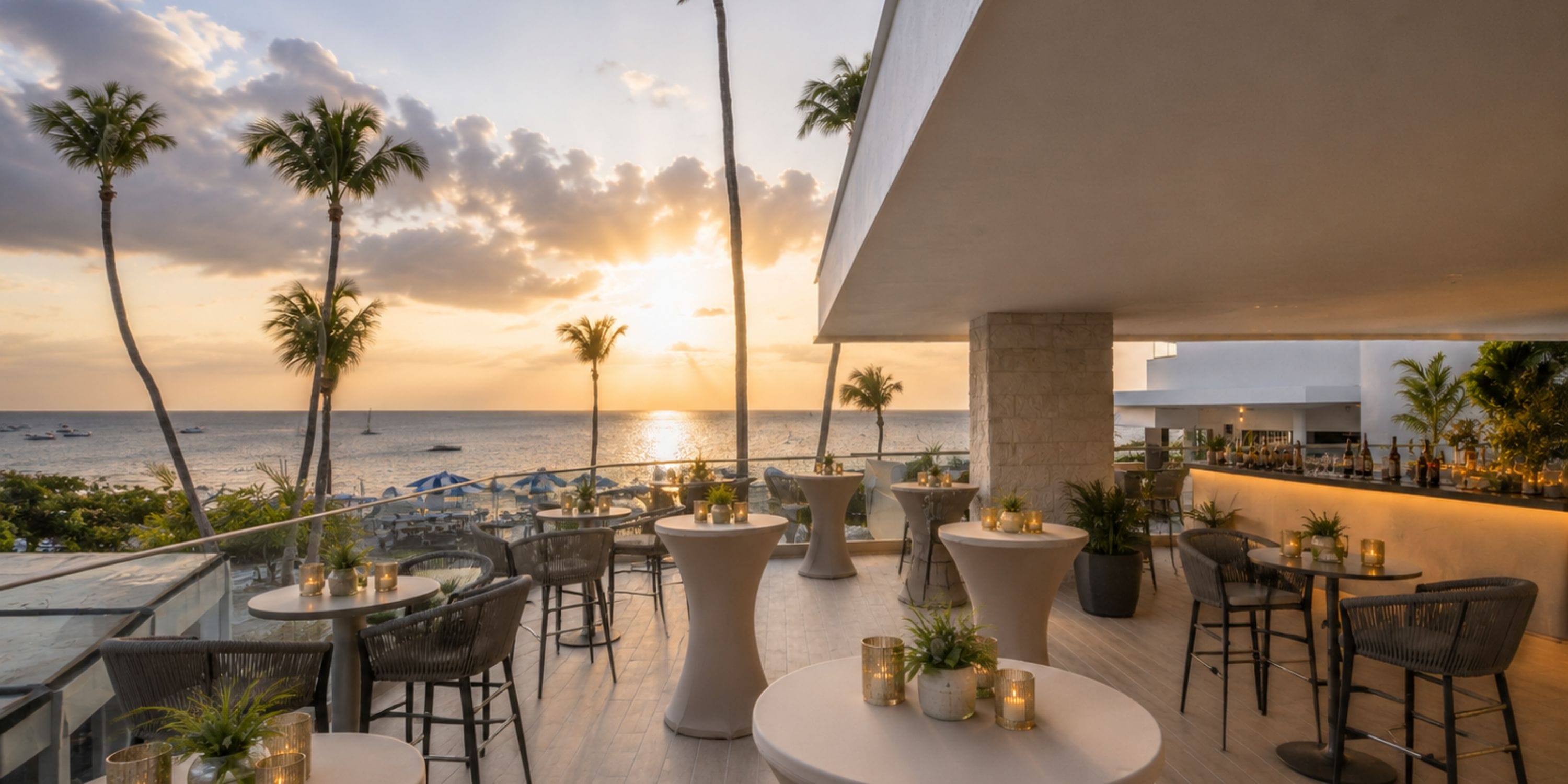 Royalton Vessence Barbados: Romantic terrace for destination wedding, ocean views, sunset candles.