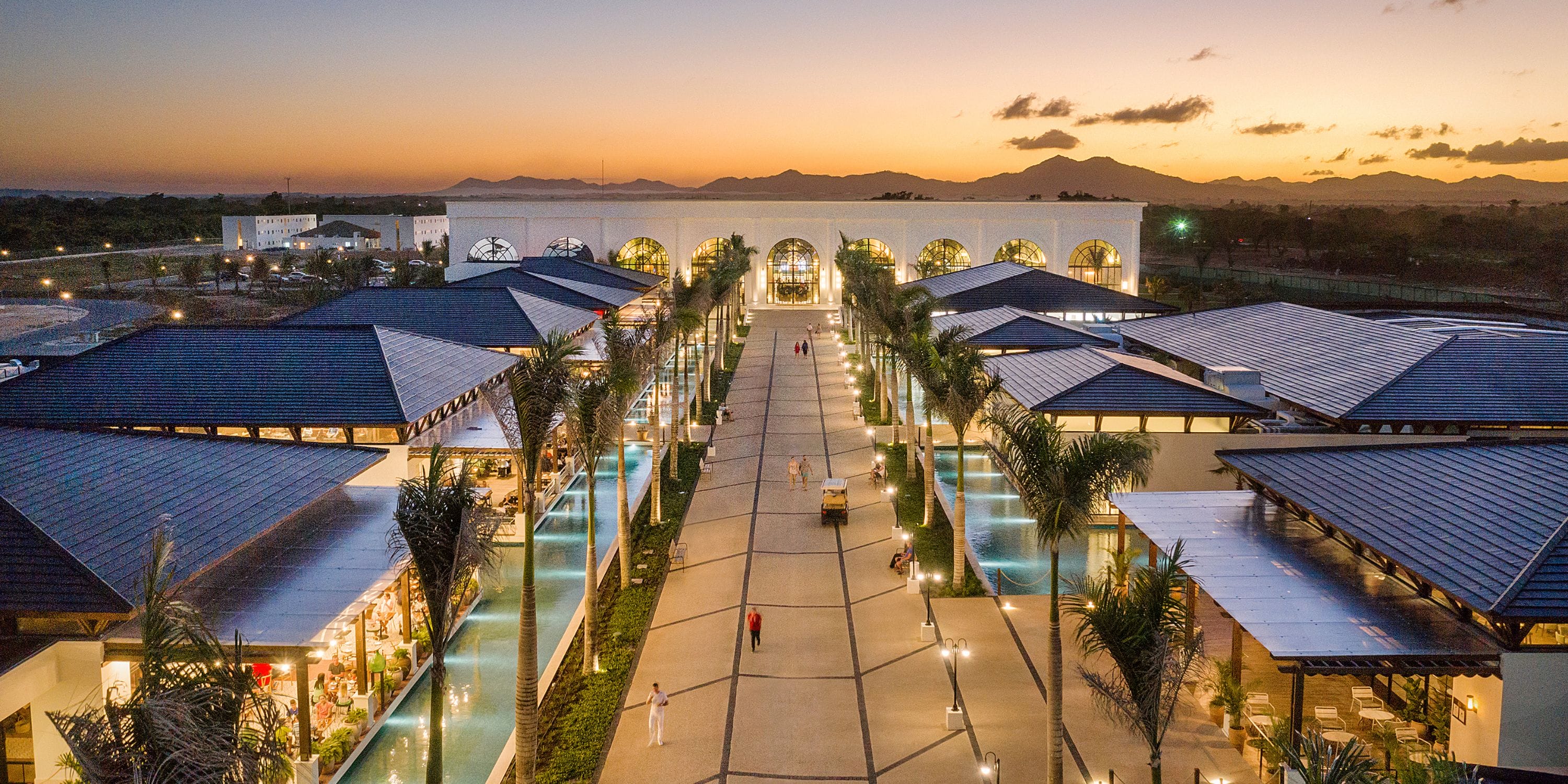 El Beso at Ocean El Faro offers shops, pools, and scenic mountain views&mdash;ideal for a destination wedding.