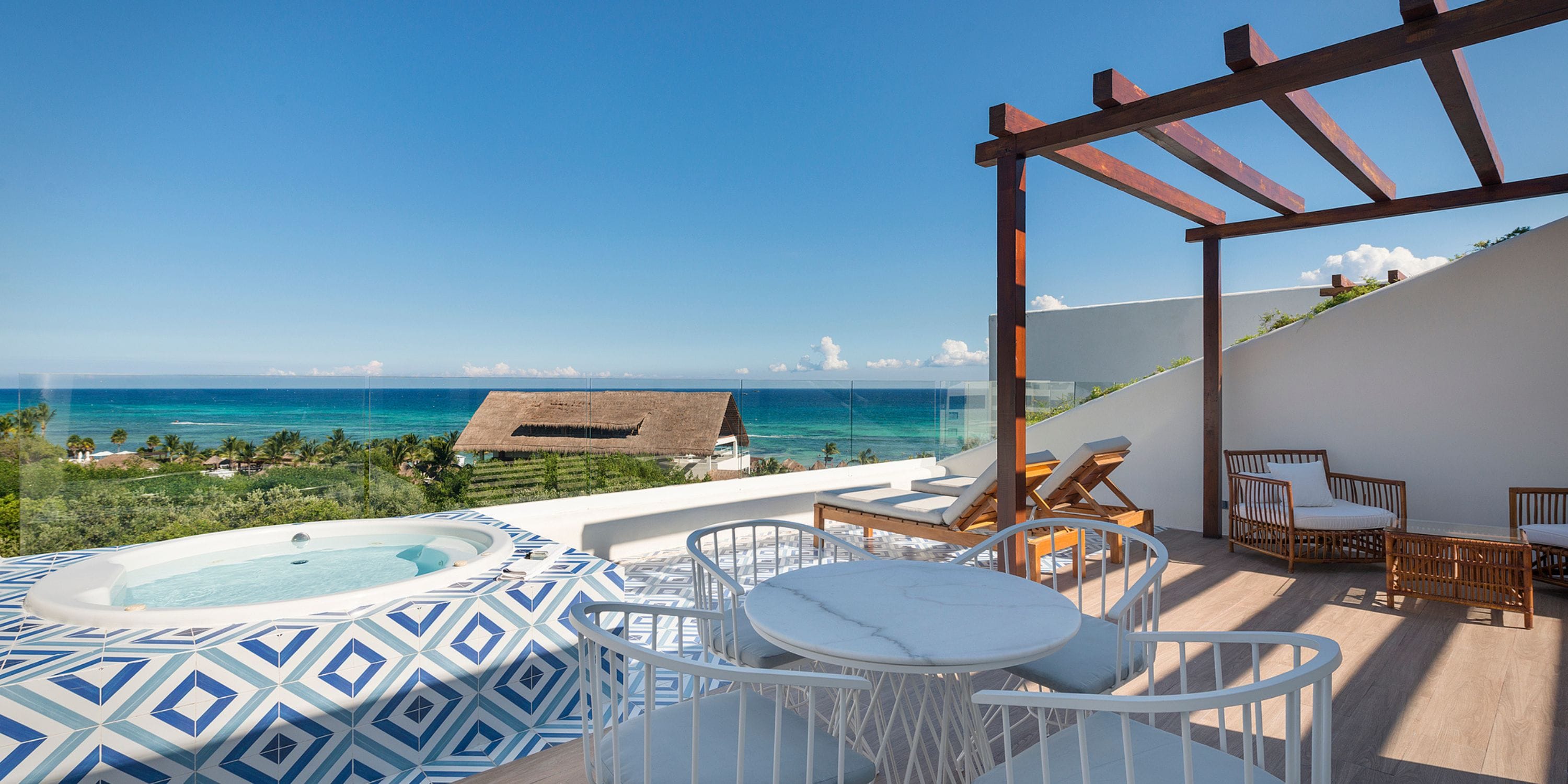 Rooftop terrace at Ocean Riviera Paradise, perfect for a destination wedding, with hot tub and ocean view.