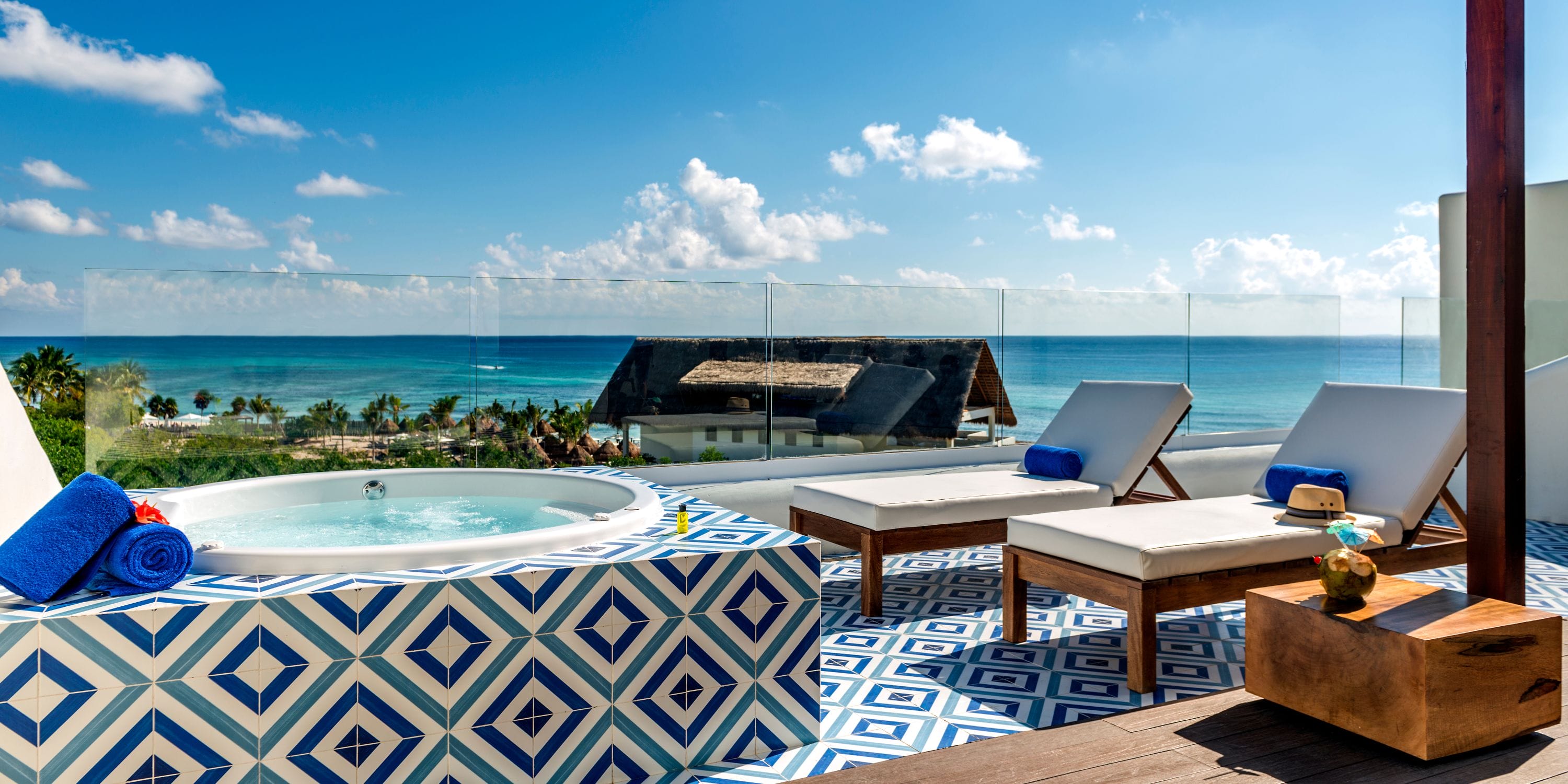 Ocean Riviera Paradise: Ideal rooftop terrace for a destination wedding, with jacuzzi, lounge chairs and ocean view.
