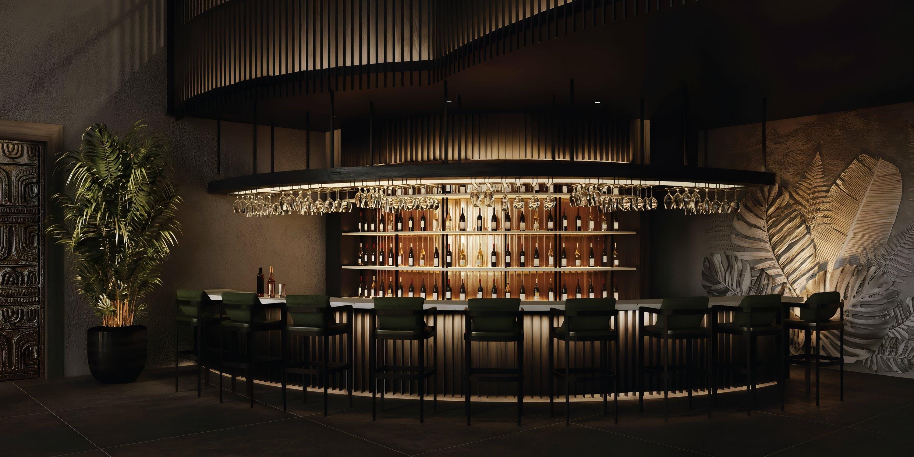 Chic bar at Lopesan Serenity Bay Resort Spa & Casino, perfect for destination weddings&mdash;dark seats, backlit shelves, and lush plants.