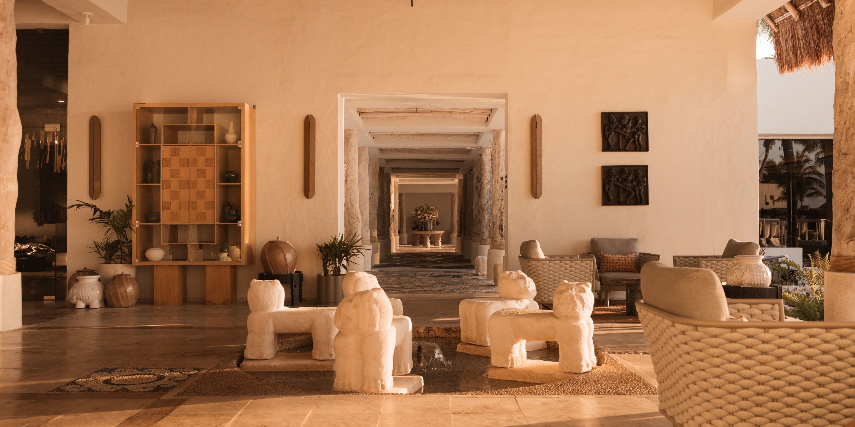 A sunlit, modern lobby perfect for destination wedding arrivals at Royalton Riviera Cancun.