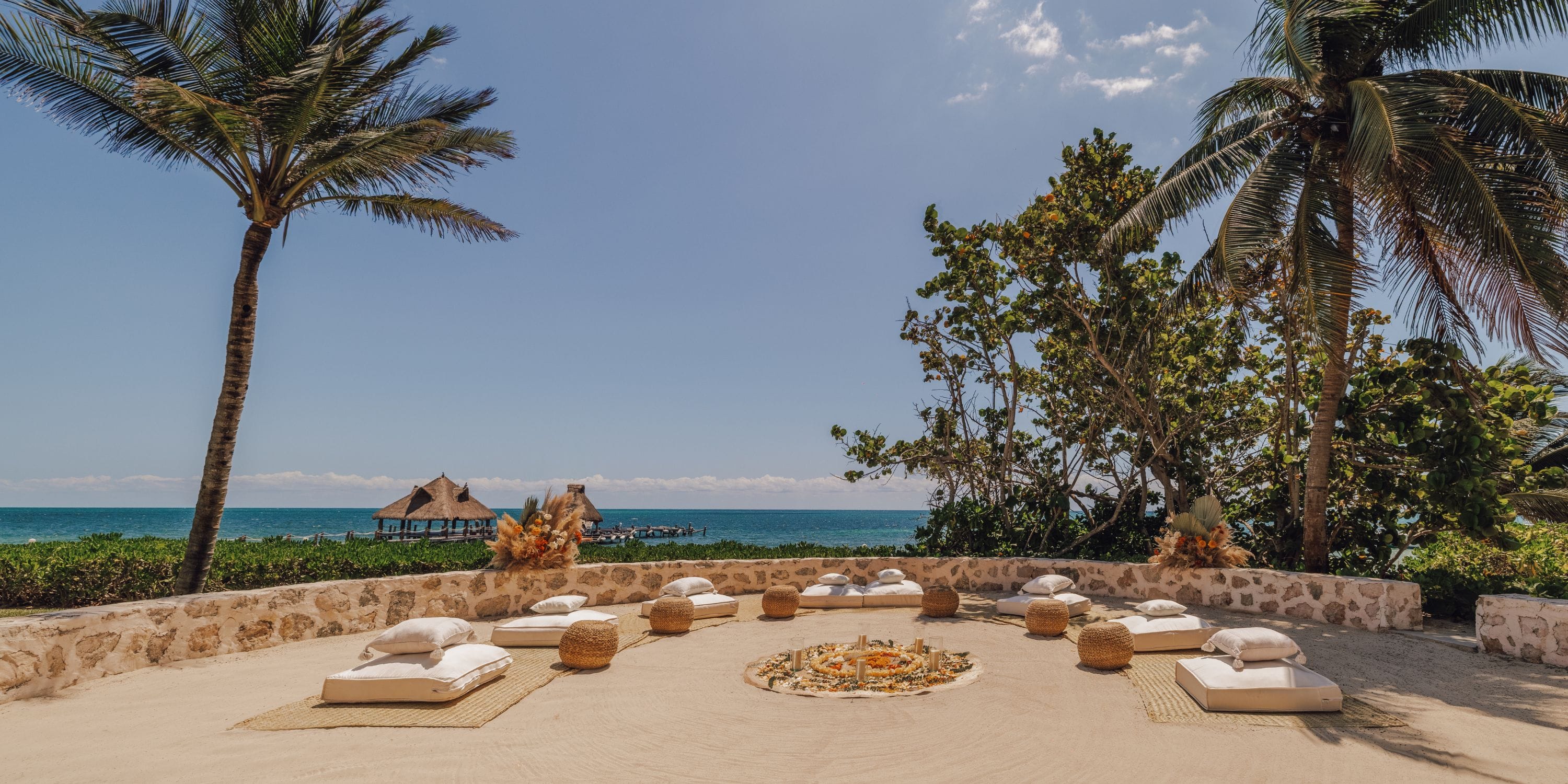 Outdoor lounge with fire pit, perfect for destination weddings at Royalton Riviera Cancun.