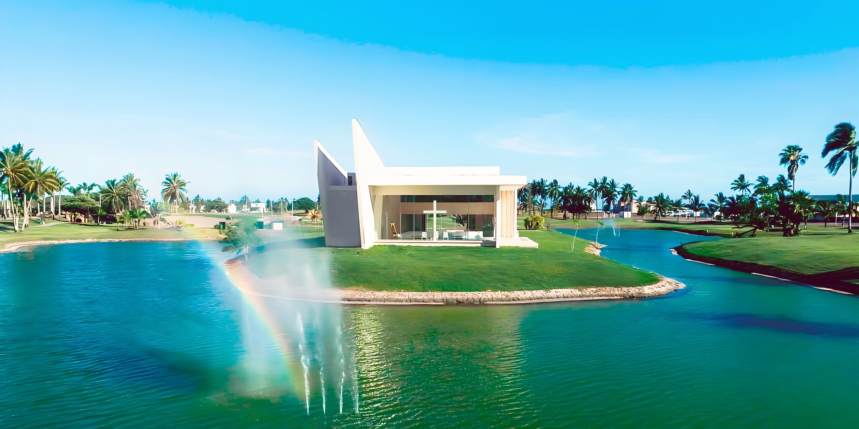Modern white building with big windows on an island, perfect for a destination wedding setting.