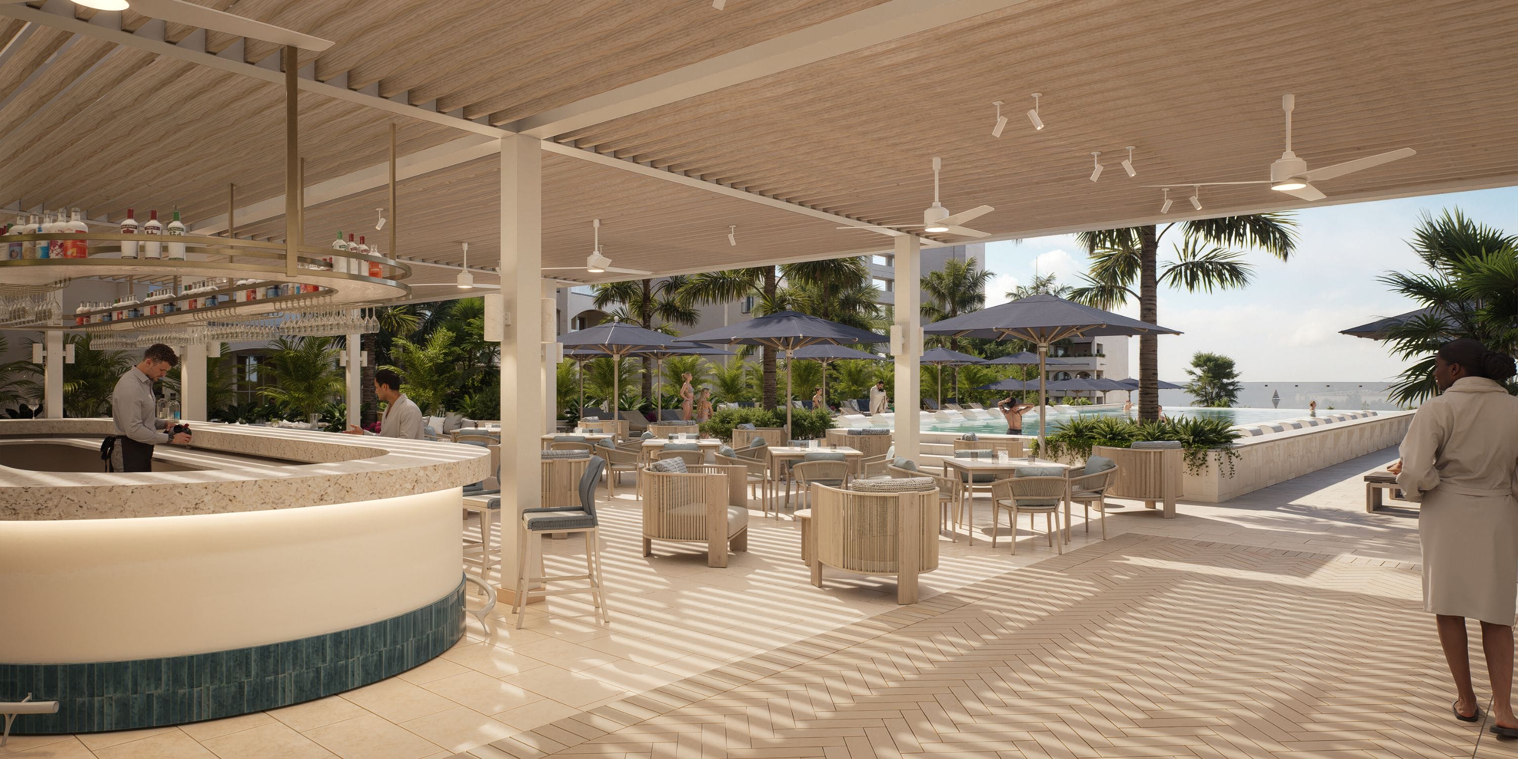 Ocean-view poolside bar at Royalton Riviera Cancun&mdash;perfect for a destination wedding celebration.