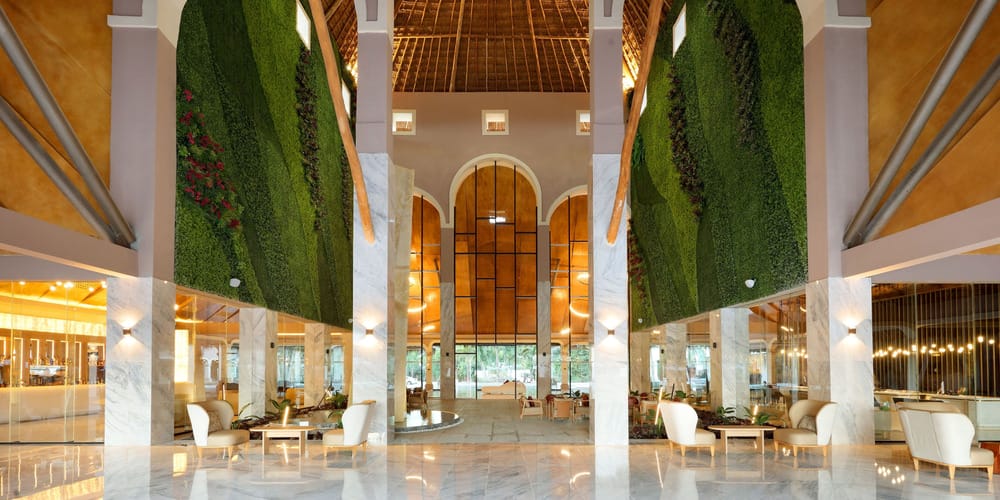 Elegant hotel lobby with high ceilings and marble floors, perfect for a destination wedding.