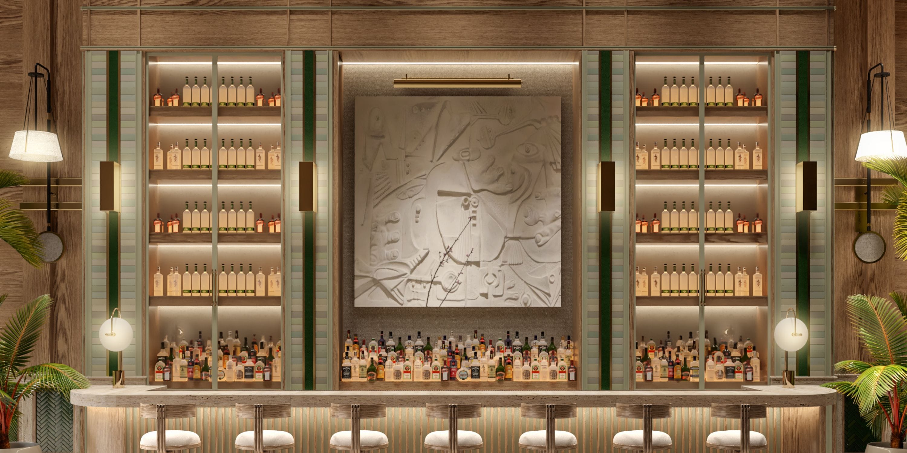 UNICO 18&deg;77&deg; Montego Bay bar for destination wedding, with shelves, art, and five barstools.