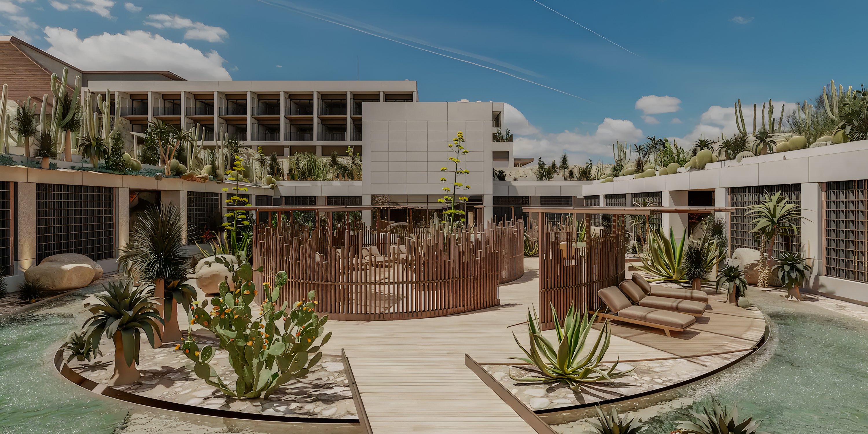 Grand Hyatt Los Cabos: modern courtyard—wood walkways, desert plants, lounge chairs for weddings.