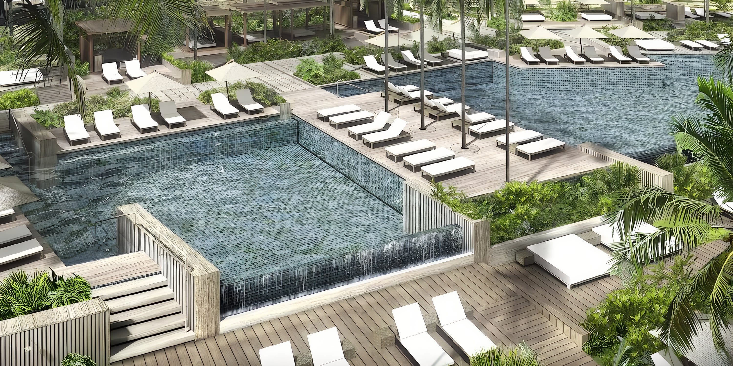 Ideal destination wedding spot: modern outdoor area with tiered pools, loungers, and lush greenery.