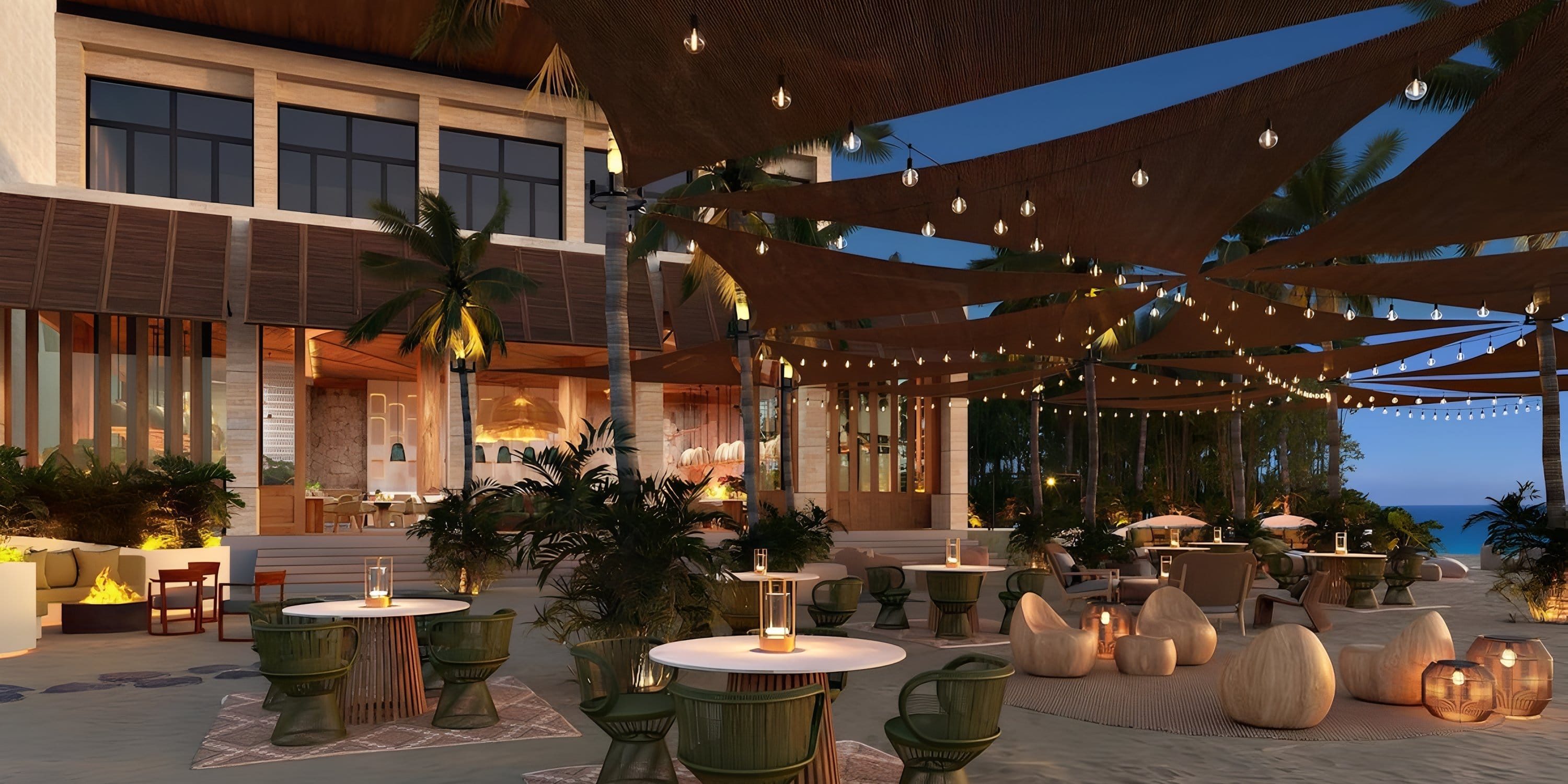Beachside wedding dining with string lights, shaded seats, and palms at sunset at Park Hyatt.