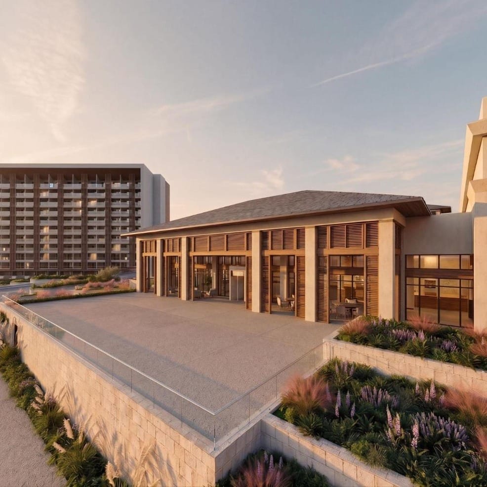 Modern resort building with a terrace, perfect for a destination wedding.