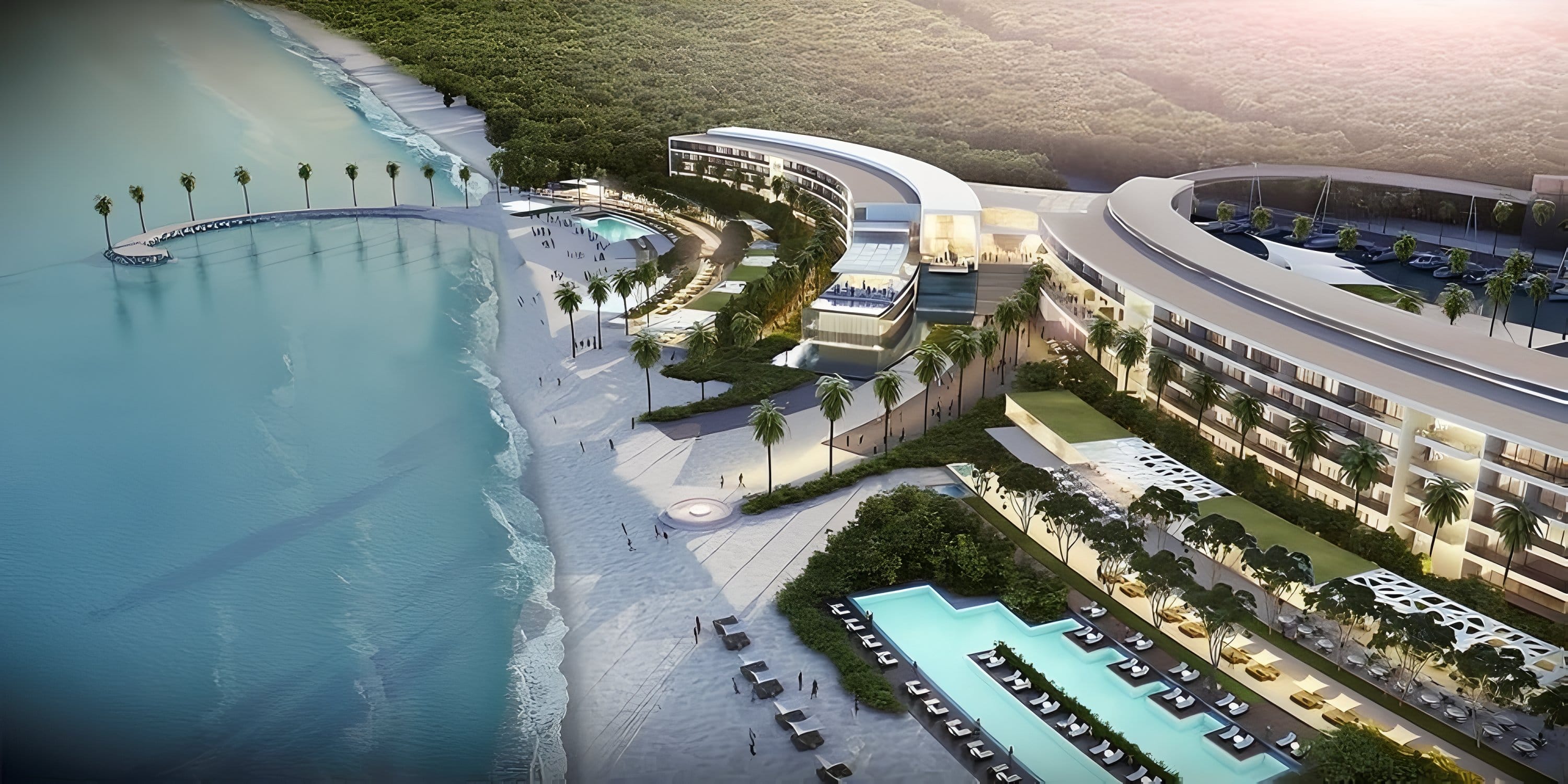 Aerial view of SLS Playa Mujeres, a destination wedding resort with a curved hotel, pools, and pier.