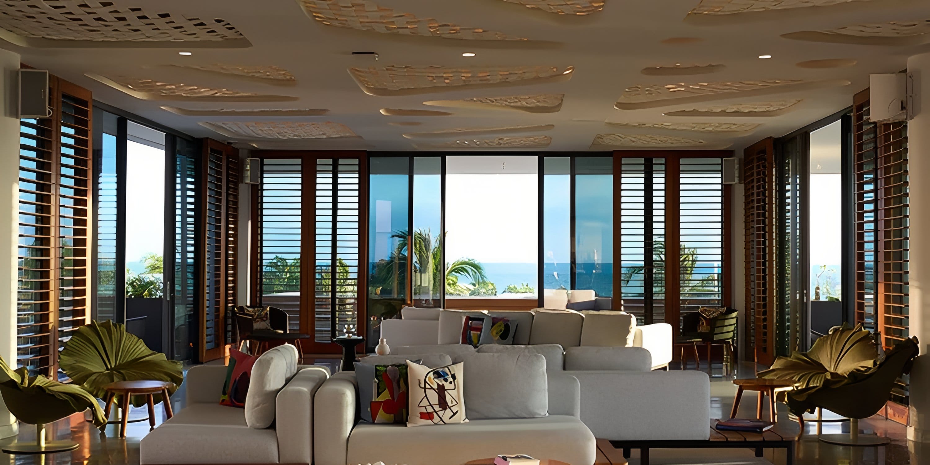 Modern wedding lounge at Dreams Playa Mujeres opening to a terrace with an ocean view.