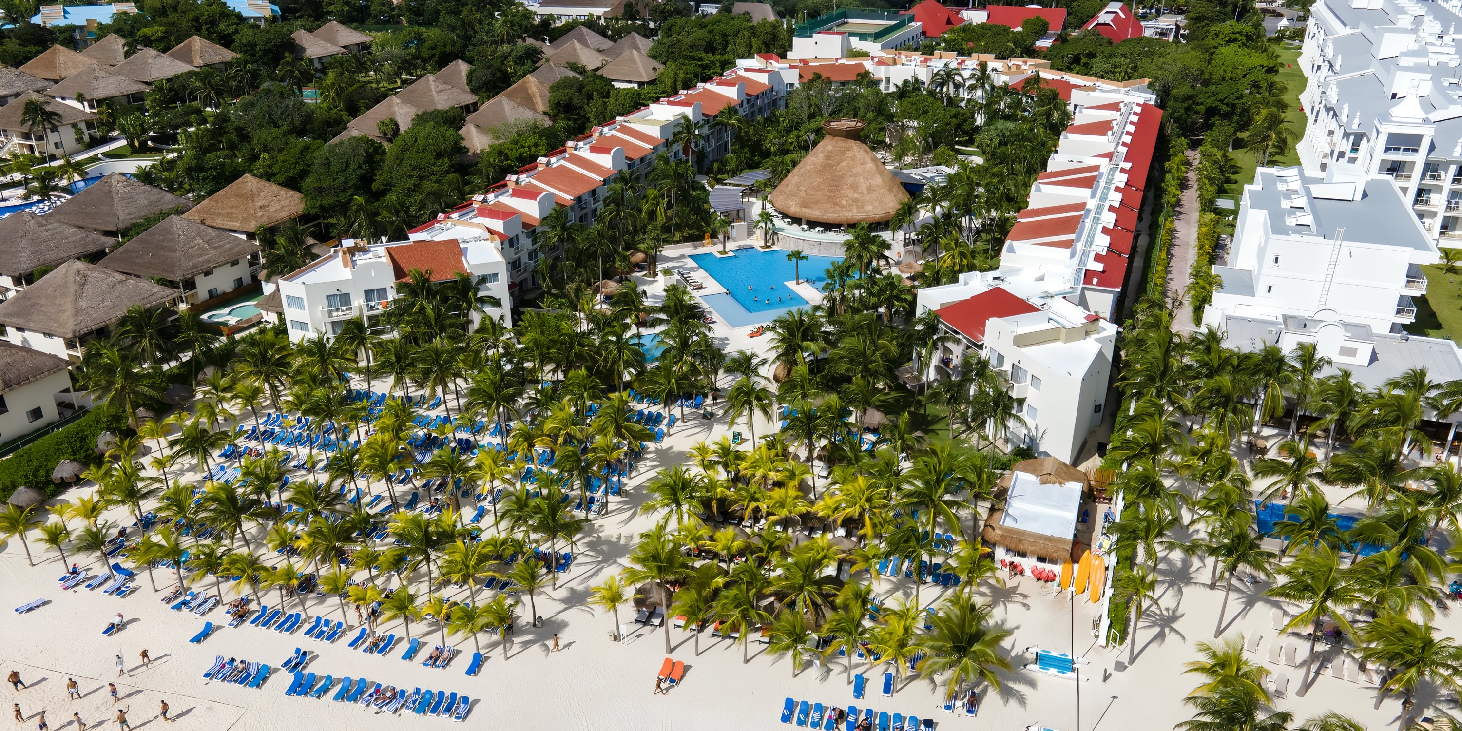 Aerial view of Viva Maya by Wyndham, a destination wedding resort with pools and white sand.