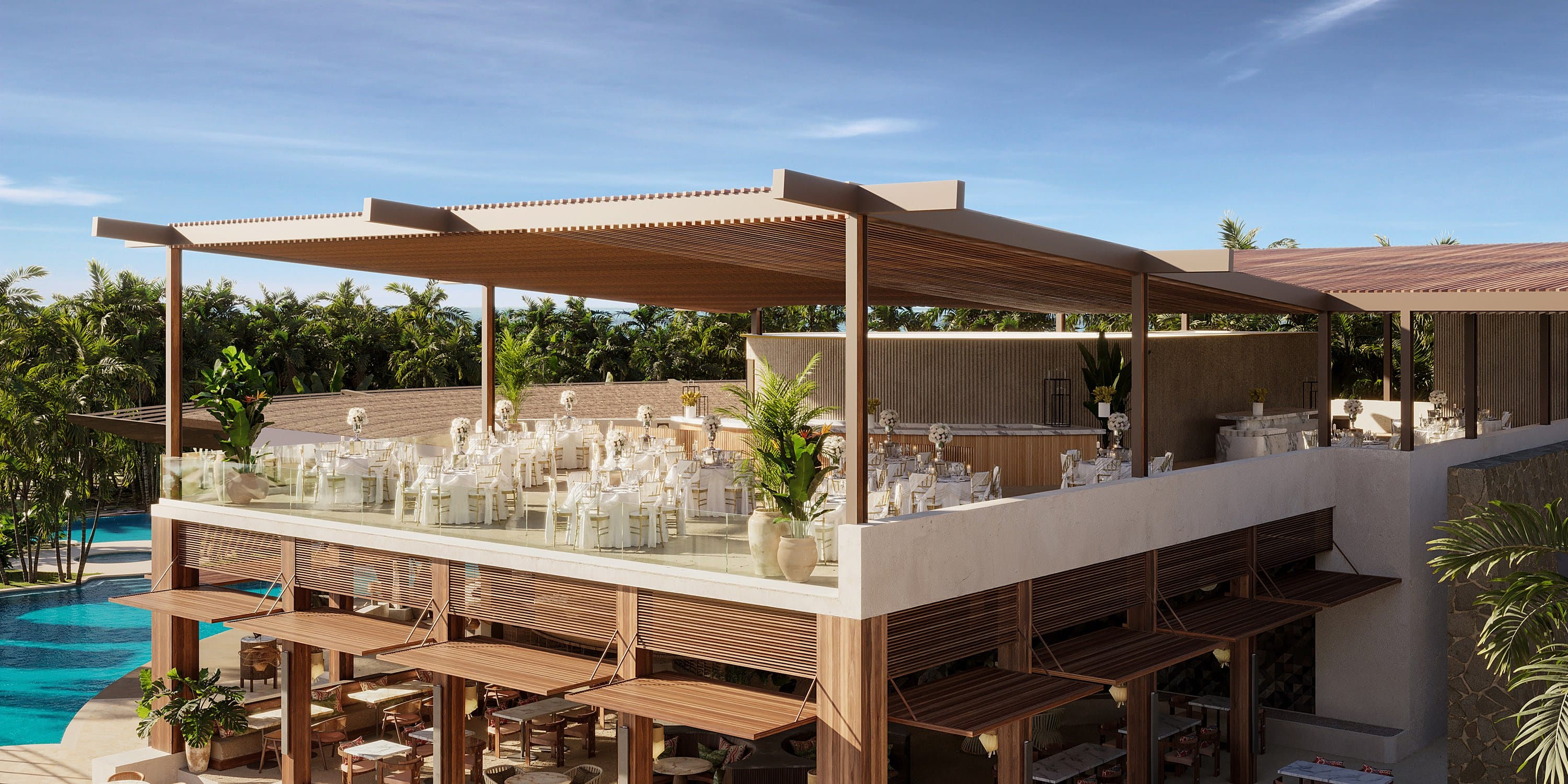 Rooftop terrace overlooking a pool, prepared for a destination wedding.