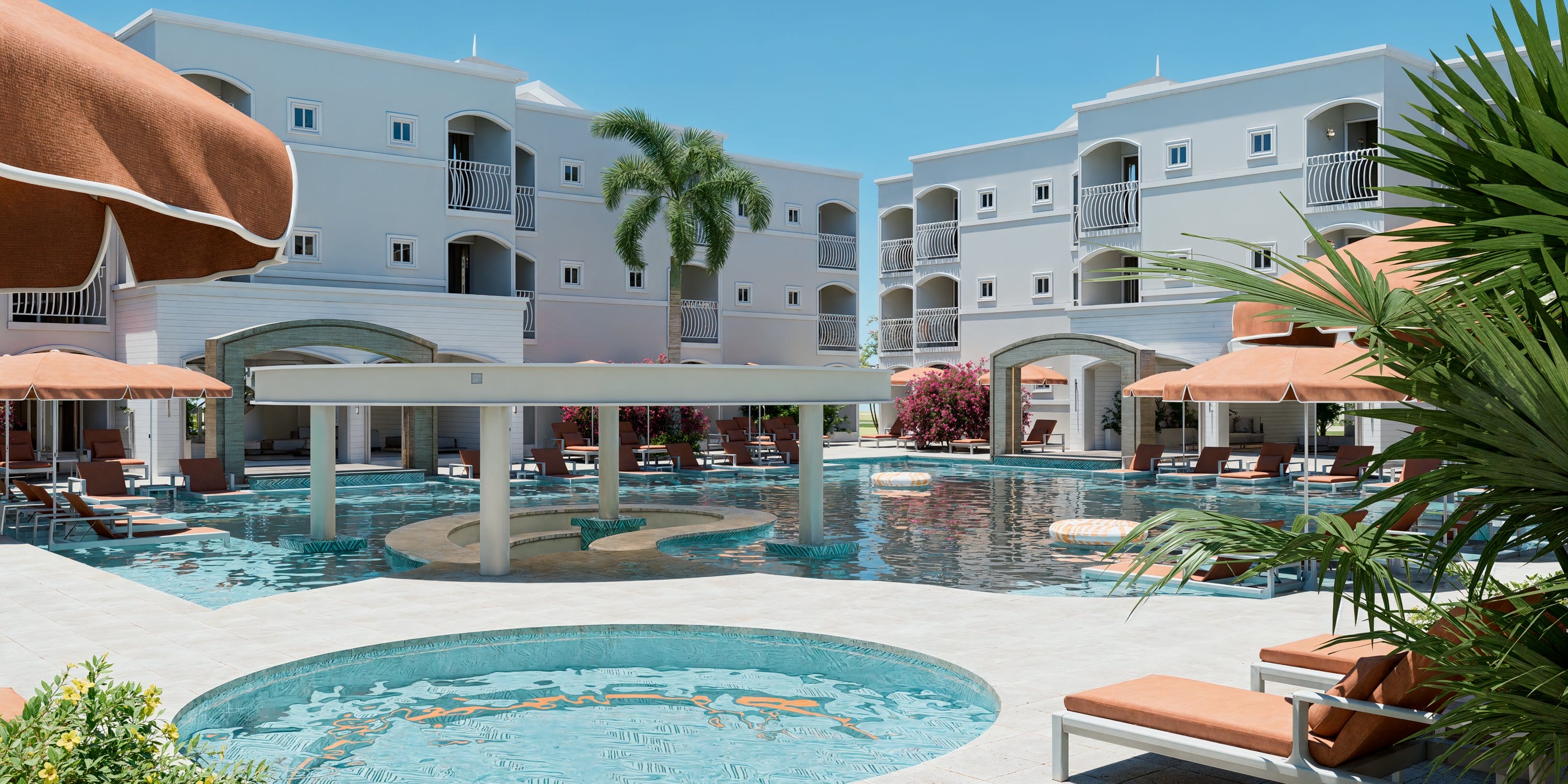Swimming pool with lounge chairs and umbrellas at Royalton CHIC Antigua for a destination wedding.