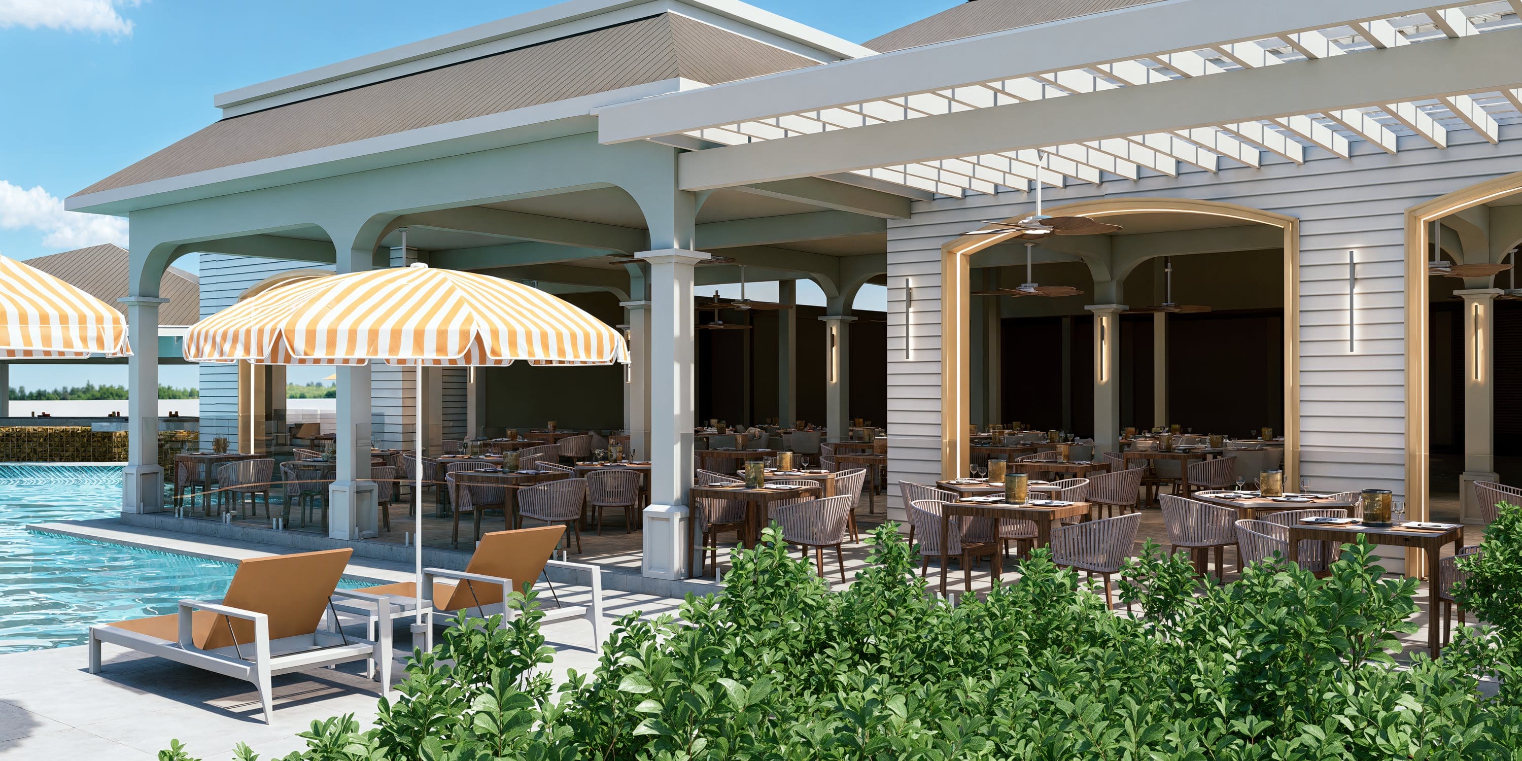 Outdoor restaurant patio by a pool at Royalton CHIC Antigua, an ideal destination wedding spot.